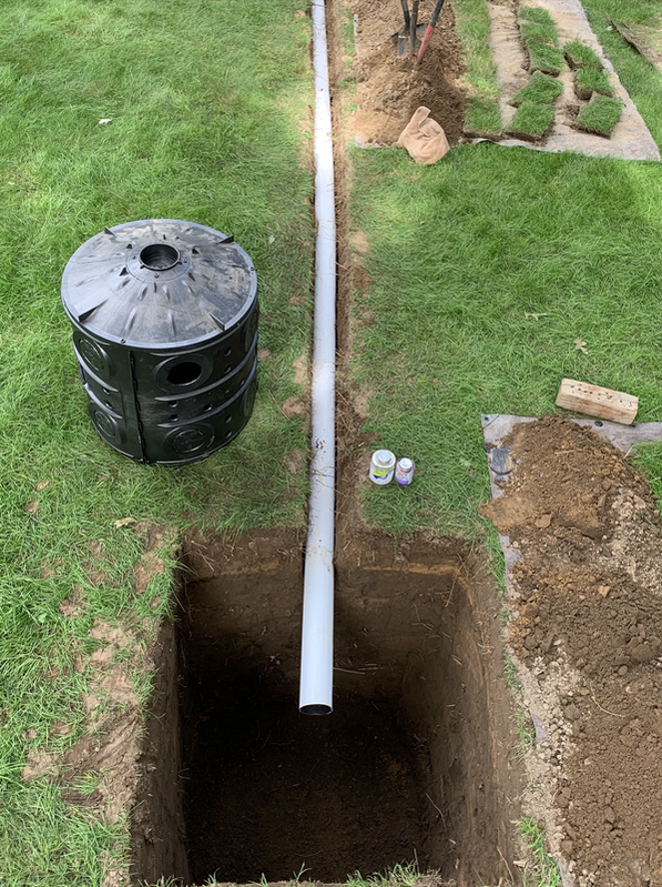 Drainage solutions for water issues outside a house. DIY drainage system ideas for building a french drain, underground downspout, catch basin, dry well, foundation drainage, yard drains. How to install outdoor drainage around a home and landscape.